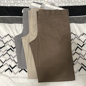 3 Men’s Express Photographer Pants. Size: 30/32. Colors: Gray, Khaki, Brown.